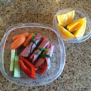 Roast Beef Roll-ups with veggies and oranges